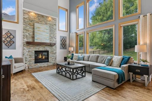 2 story tall living room with walls of windows!