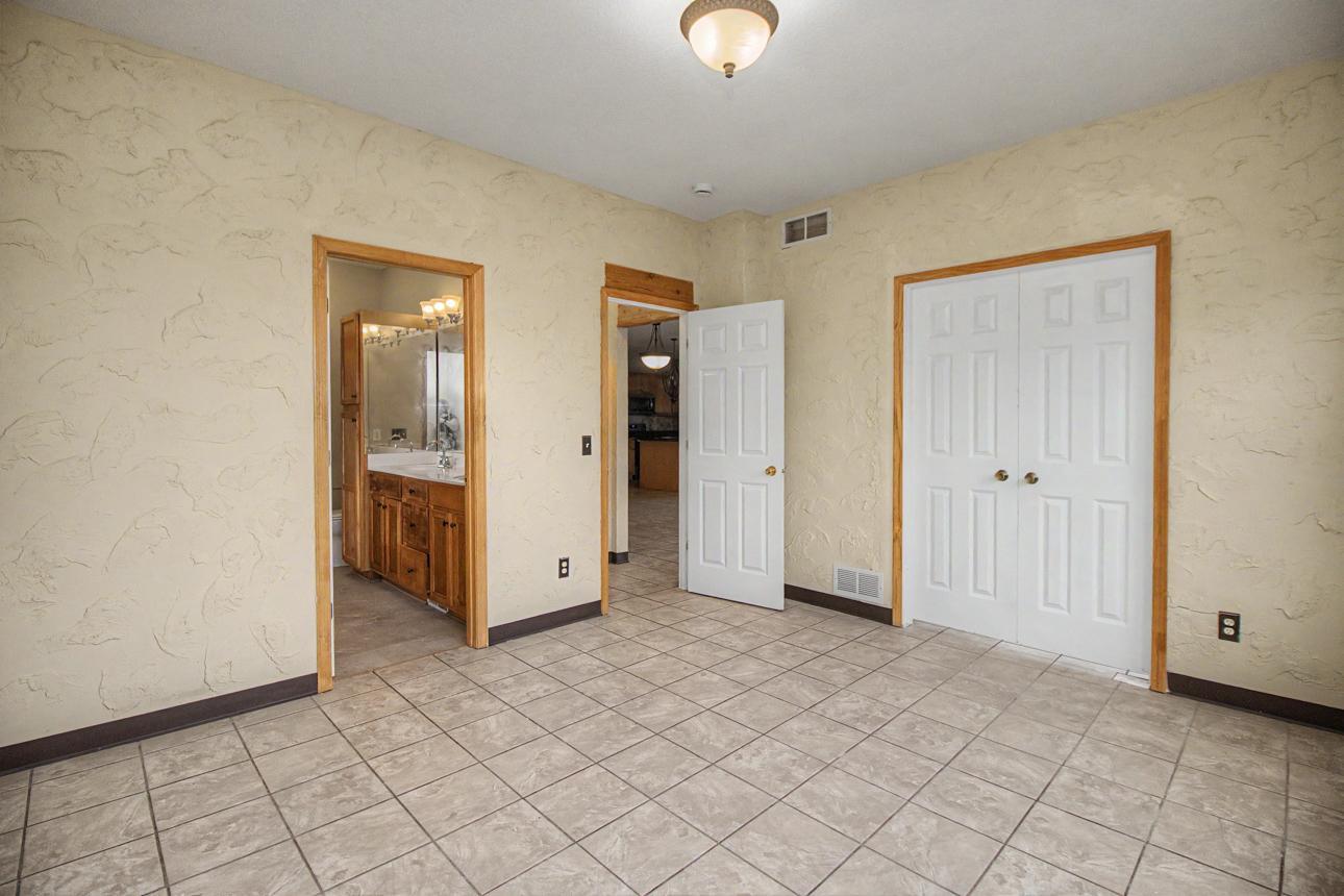 Bedroom 1 with private bathroom on main level