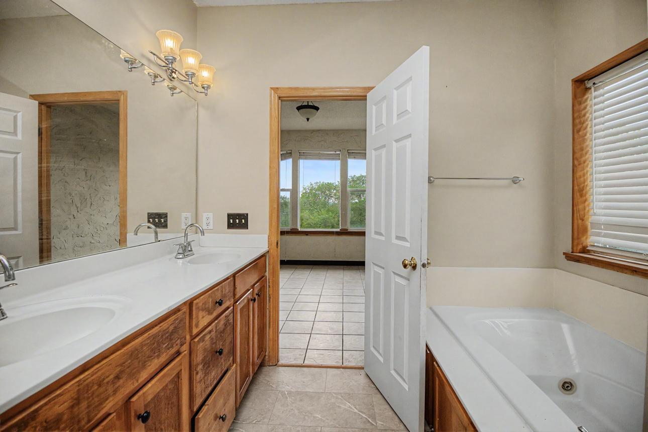 Full bathroom with whirlpool on main level