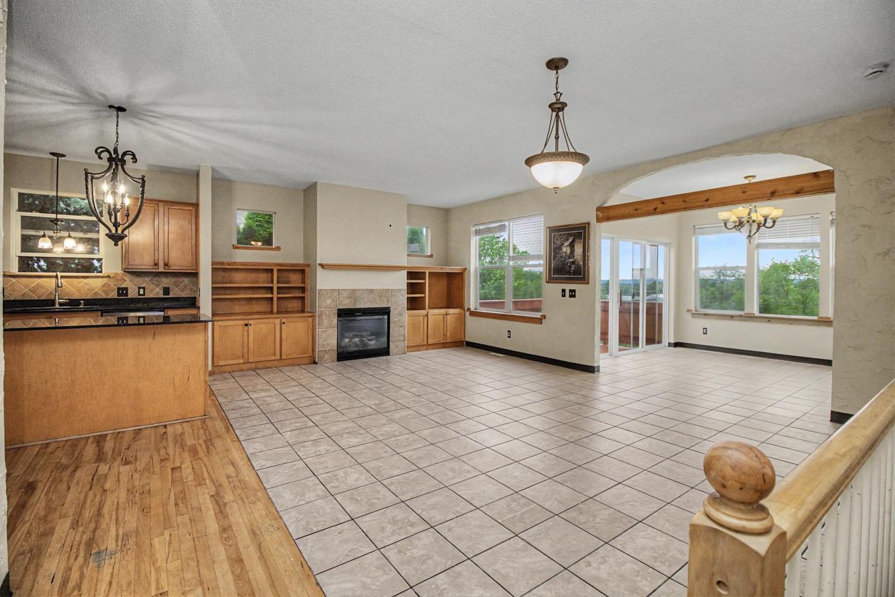 Main floor offers a spacious living room with gas burning fireplace