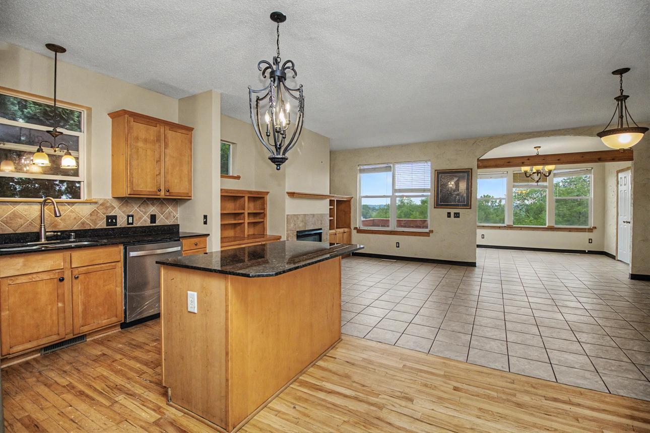 Kitchen features a breakfast bar on the center island