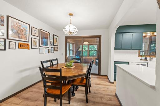 Dining area is conveniently located off of the kitchen, living area and sunroom.