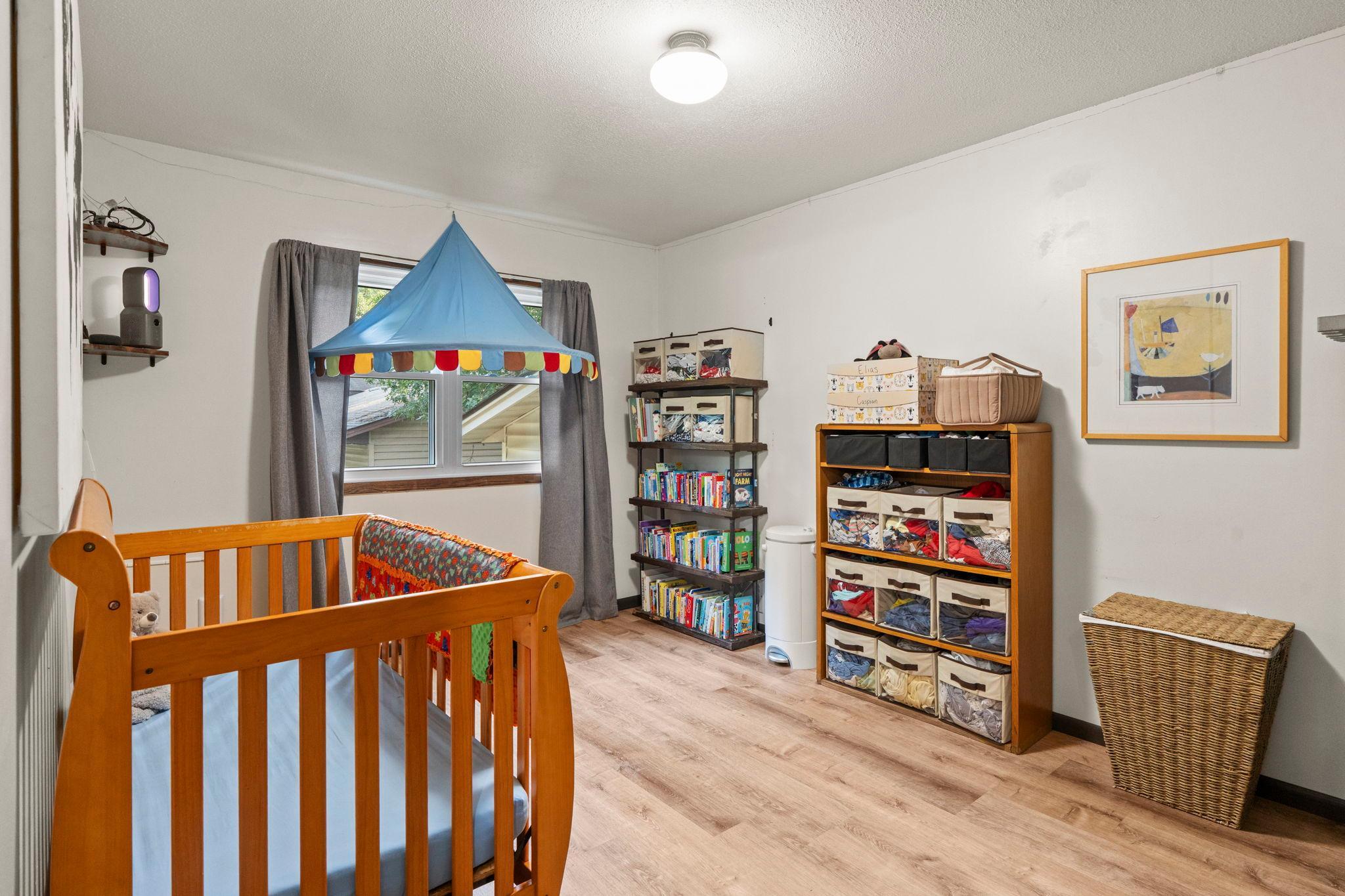 2nd bedroom on the upper level- LVP flooring throughout the upper level
