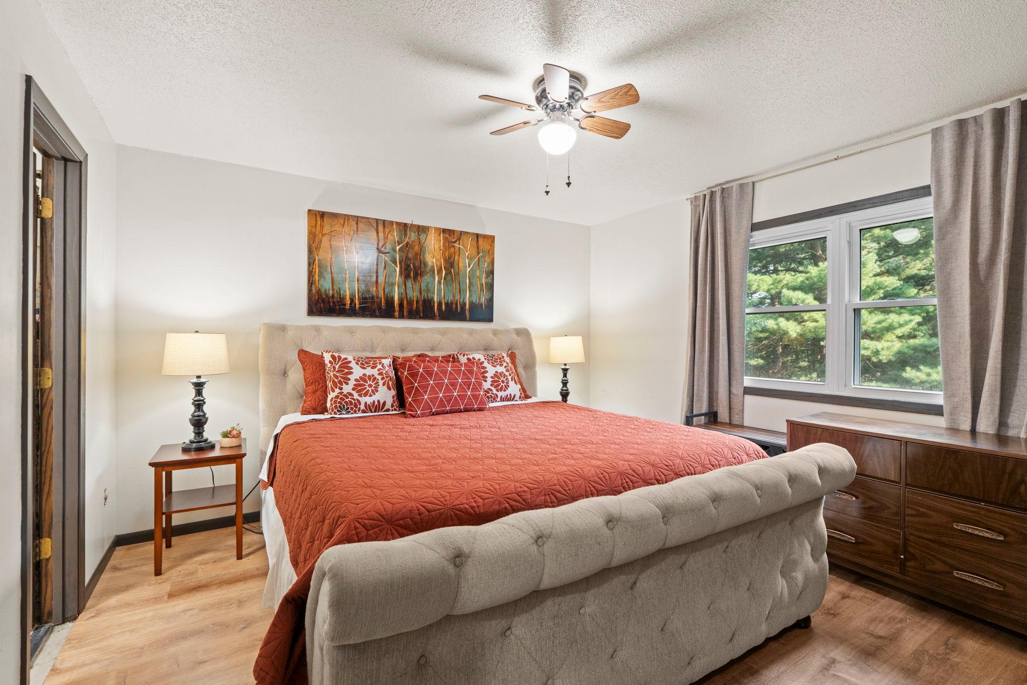 Spacious primary bedroom and newer windows