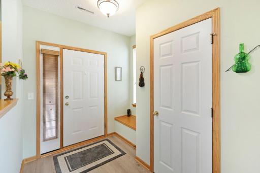 This foyer offers both a closet AND space to sit and put on / take off shoes (with storage underneath). Easy peasy for snowy days.