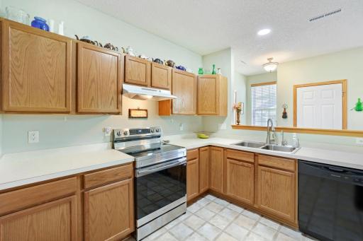 The kitchen has a stainless range, in addition to dishwasher, microwave and fridge.