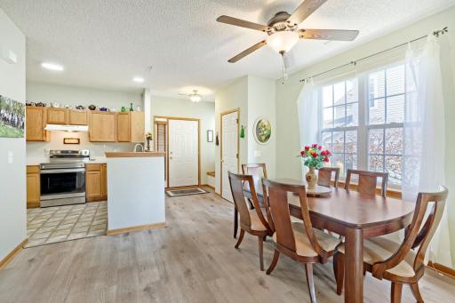 Lots of light with both a sliding door at the end of the living room and this large window in the dining space.