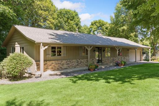 Welcome home to this charming 4-bedroom, 3-bath rambler set on a private, wooded .48-acre lot in the Minnetonka School District