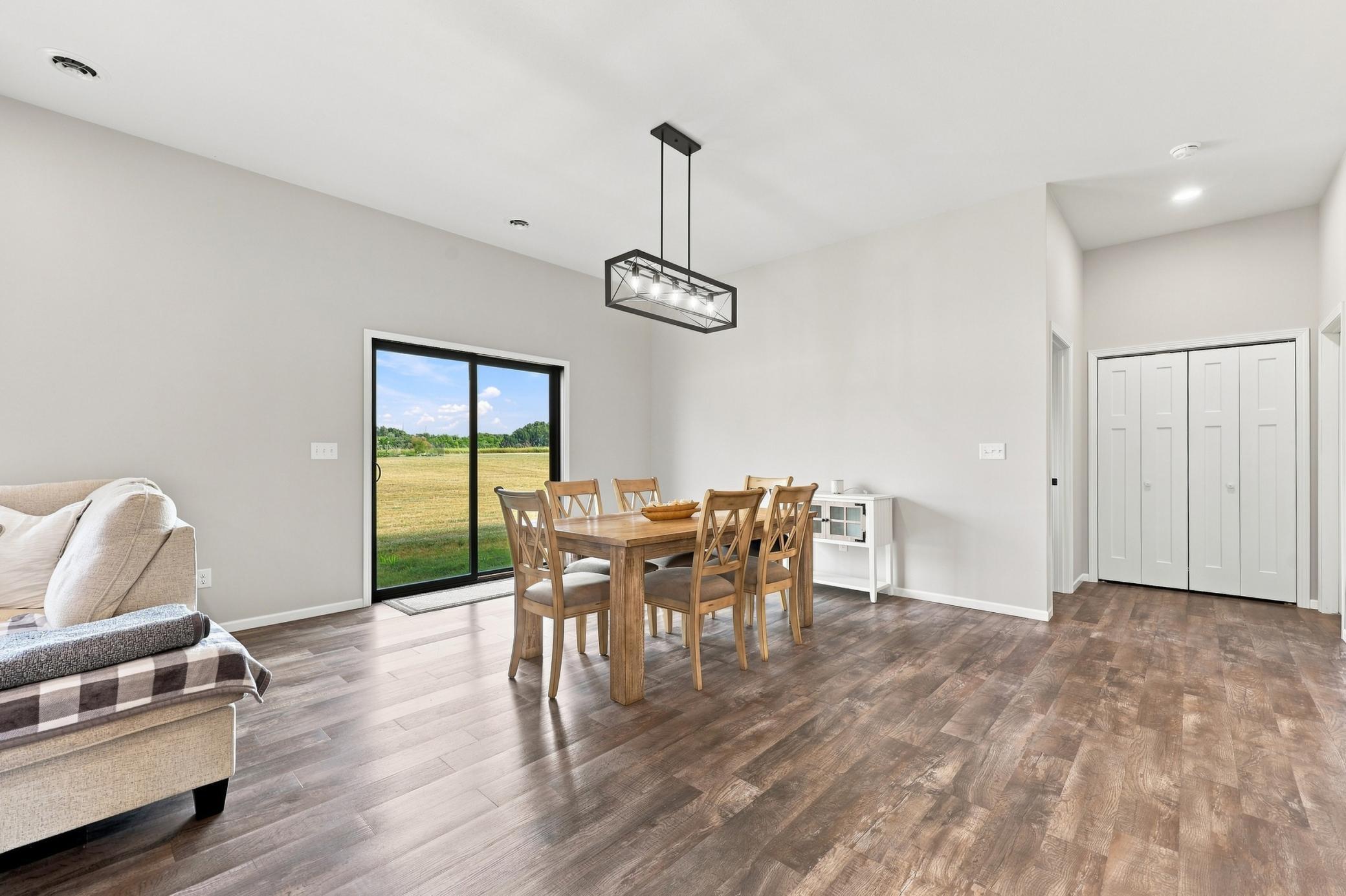 Dining area with patio to backyard with no backyard neighbors!