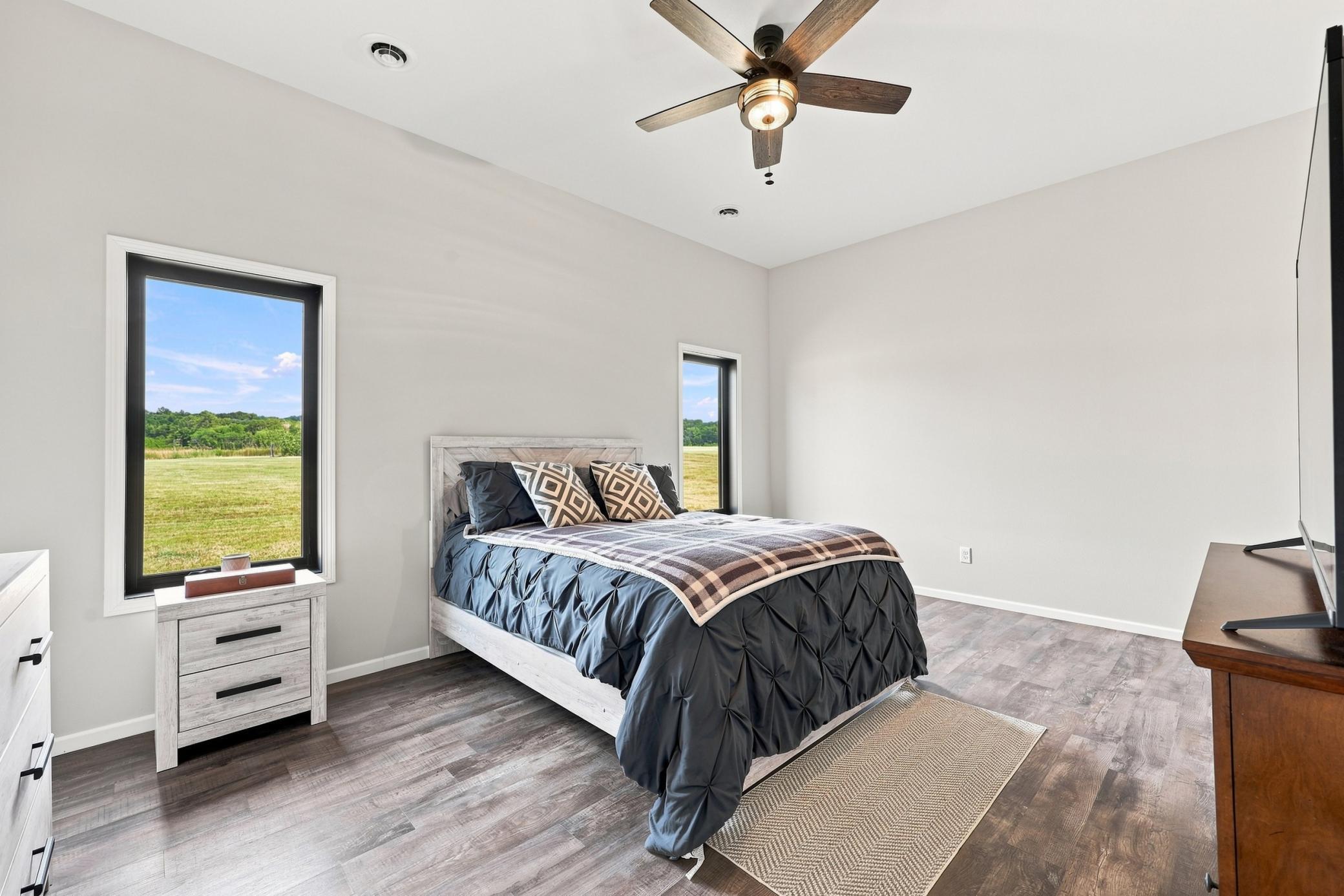 Master Bedroom on opposite location of 2 additional bedrooms