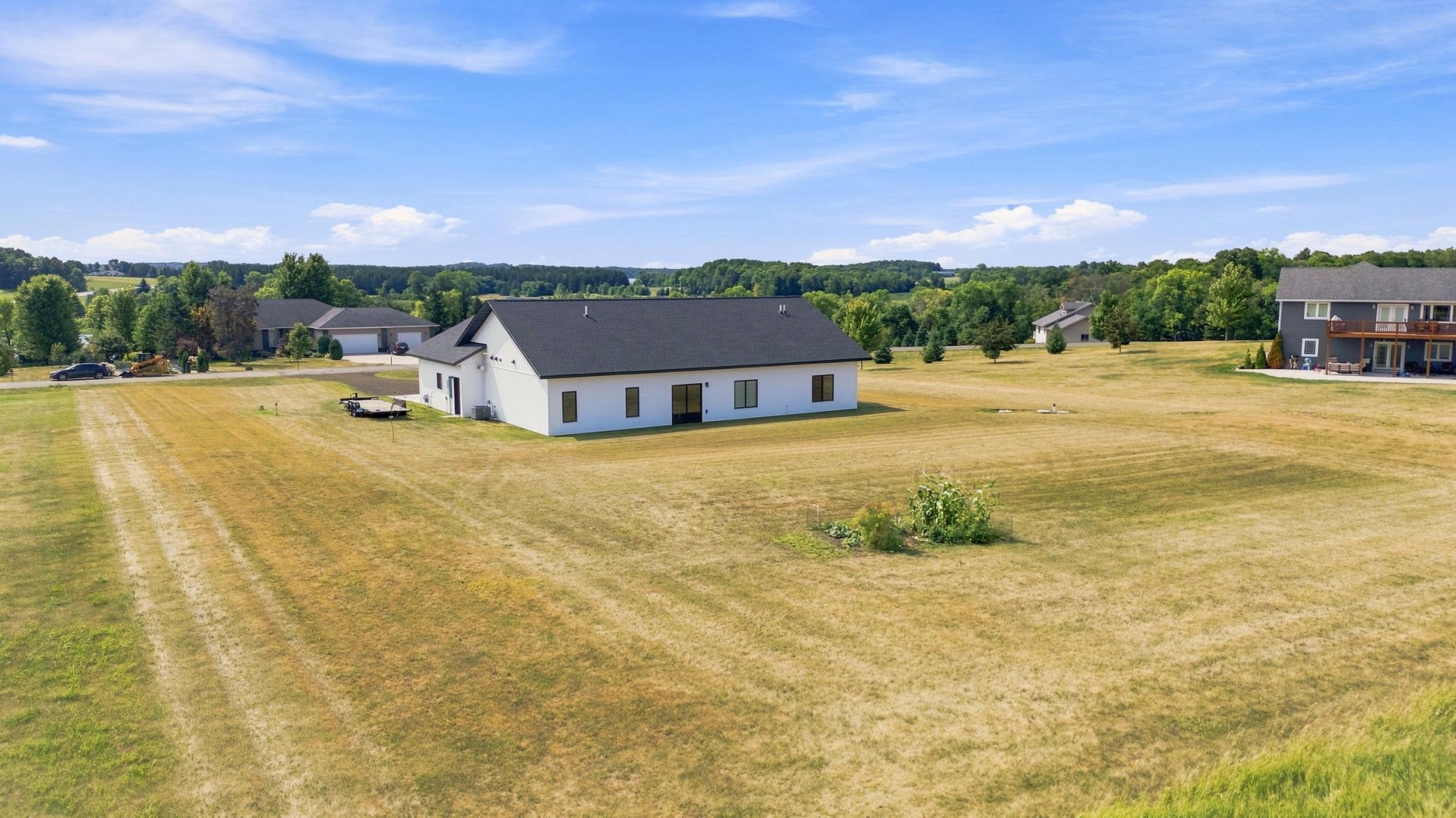 Rear of Subject Property with plenty of room for outbuilding and gardening!