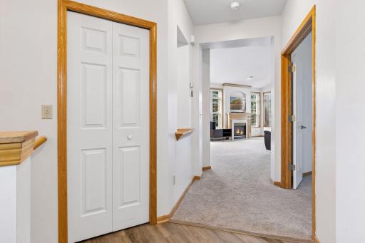 Welcoming entryway opening directly into the main living spaces with accessibility-friendly wide door openings and generous closet storage.