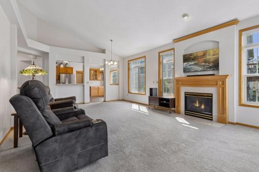 Spacious living area seamlessly connecting to the informal dining and kitchen areas, perfect for everyday living and entertaining.
