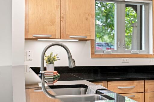Window over looks the grilling and outdoor seating area.