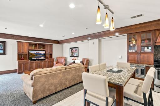 Plenty of room with a large table to the left. Located right off the lobby - perfect for a gathering!