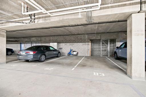 2 garage stalls righ off the lobby entrance. Check out the exceptionally large built-in storage