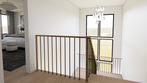 A dramatic staircase framed by soaring windows, warm wood detailing, and sleek black railings that create a striking architectural focal point.