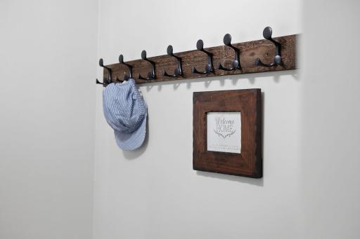 Hooks near the door keep hats, bags & leashes handy.