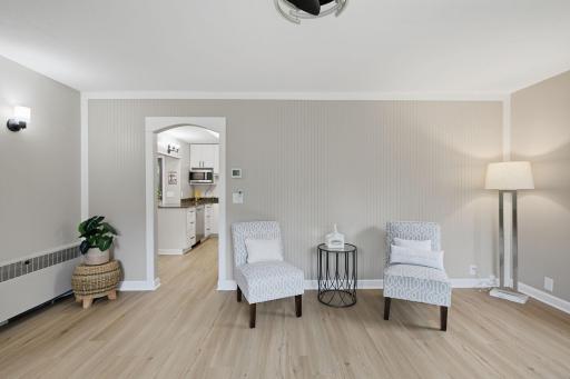 The living room opens to the kitchen, keeping the main living spaces connected.