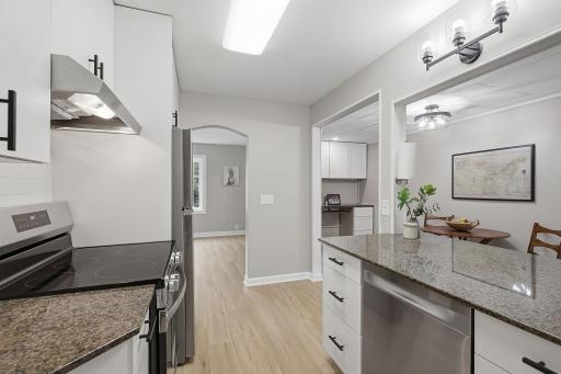 Catch up with friends in the living room while dinner simmers just around the corner.