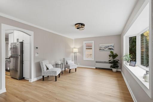 That big front window brings plenty of natural light into the living room.