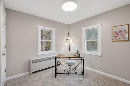 A flexible bedroom that could also serve as a home office or hobby space.