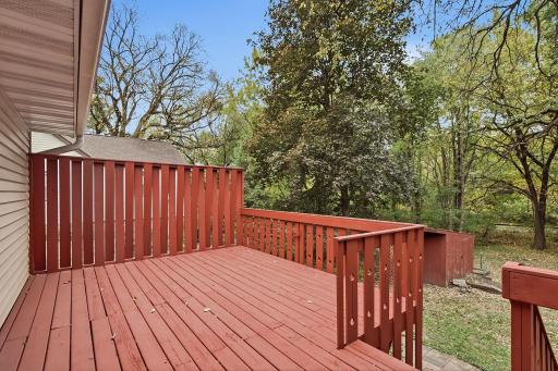 Take in the backyard views from your deck, surrounded by mature trees.