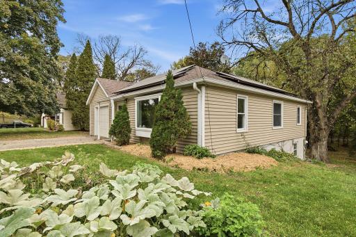 Low-maintenance siding & green space surrounding the home.