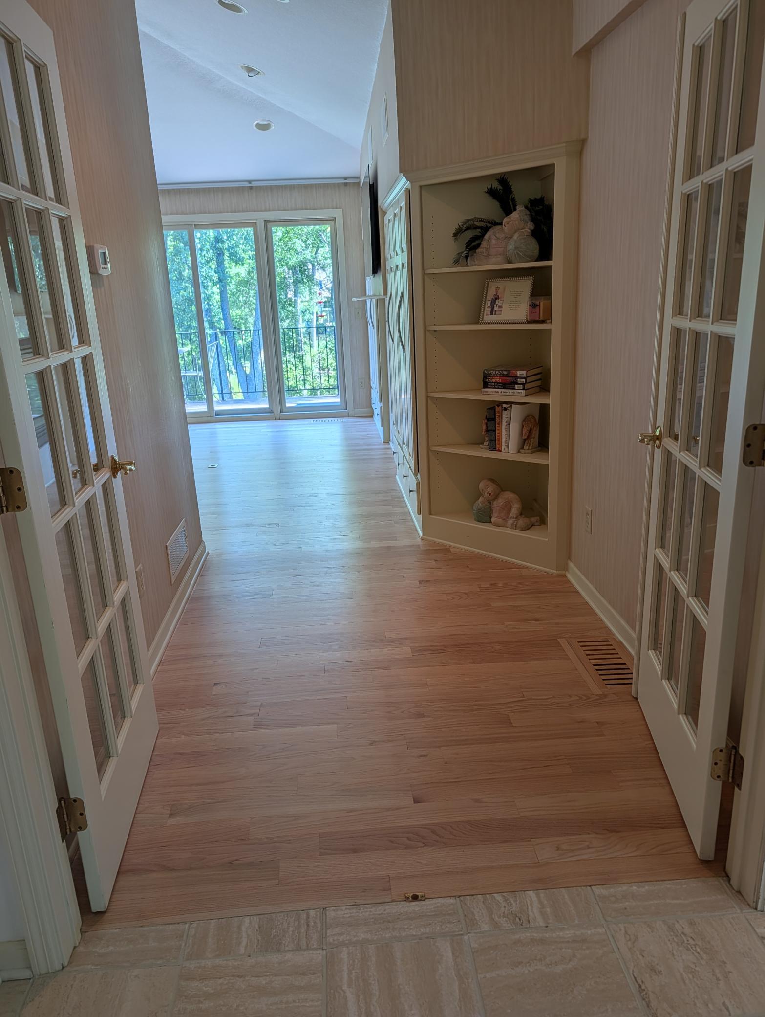 French doors opening into the primary suite