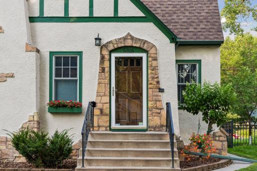 Beautiful Tudor Style with Stucco and Stone Exterior and 1 yr old roof.
