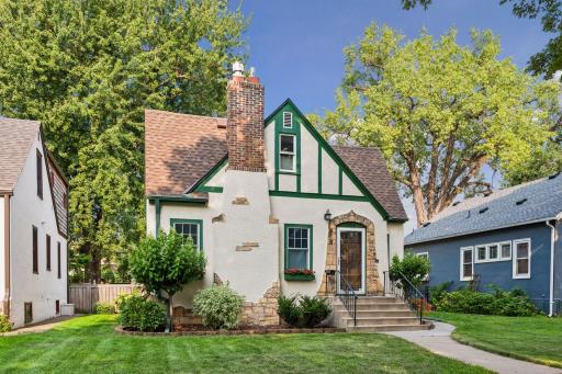 Beautiful Tudor Style with Stucco and Stone Exterior and 1yr old roof.