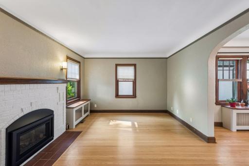 All the charm fills this home with coved ceilings and Gas insert fireplace, updated thermal pane windows throughout and original hardwood flooring.