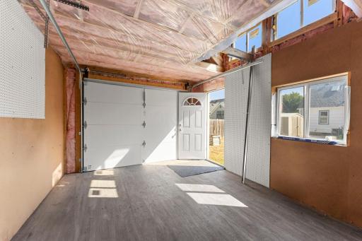 Here is an inside peek. No electricity is run to the studio. Garage door is for aesthetics only (non-functioning).