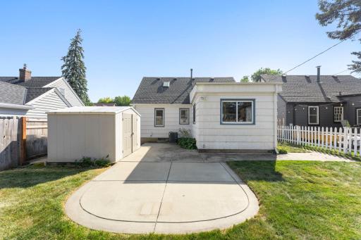 Large patio and storage shed.