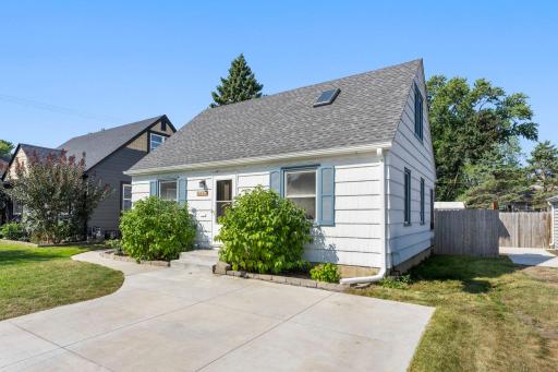 New concrete driveway comfortably fits 2-4 vehicles.