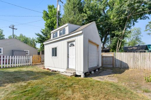 Detached bonus studio offers flexible space for a home office, art/hobby studio, kids' clubhouse or personal retreat.