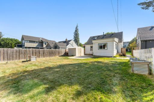 Generous fenced backyard with room to play, garden and entertain.