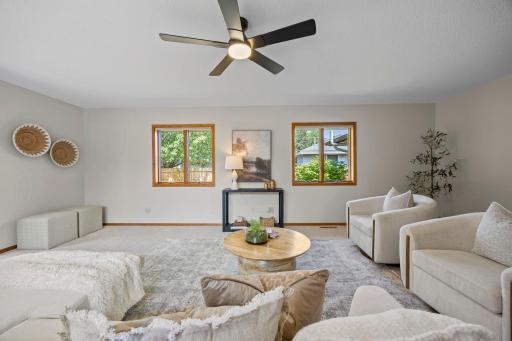 The walkout to the deck and backyard makes outdoor gatherings especially easy. With the generous backyard beyond it, this part of the home gives you the extra breathing room that is hard to find in many ramblers from this era.
