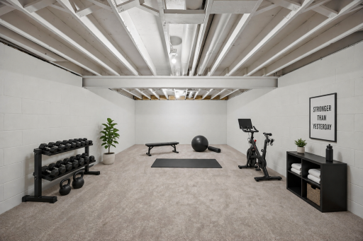 Plenty of room for movie nights, a home gym, office, hobby space, or even an additional bedroom with an egress addition!
(Virtually staged image)