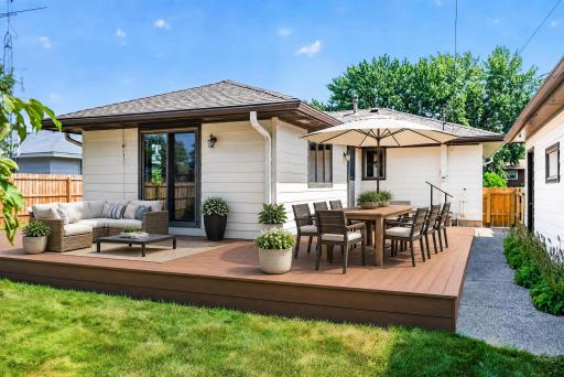 The large, maintenance-free Trex deck has ambient lighting and plenty of space to spread out.
(Virtually staged image)