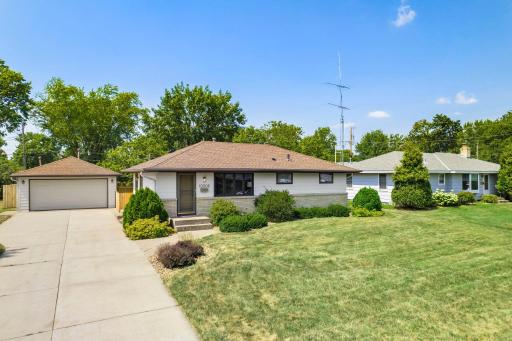 The garage: large, heated, and complete with a workshop area in back. The electrical panel was updated with a 50-amp breaker in fall 2025, and the workshop has a 240V outlet, making it a particularly useful space for projects, hobbies and storage.