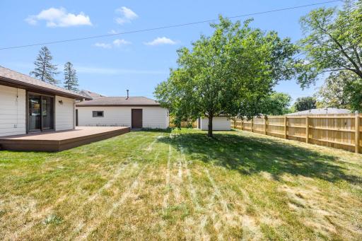 Outside is just as exciting! The new wood privacy fence, added in fall 2025, creates a great backyard for playing, entertaining, or simply enjoying some quiet time outside.