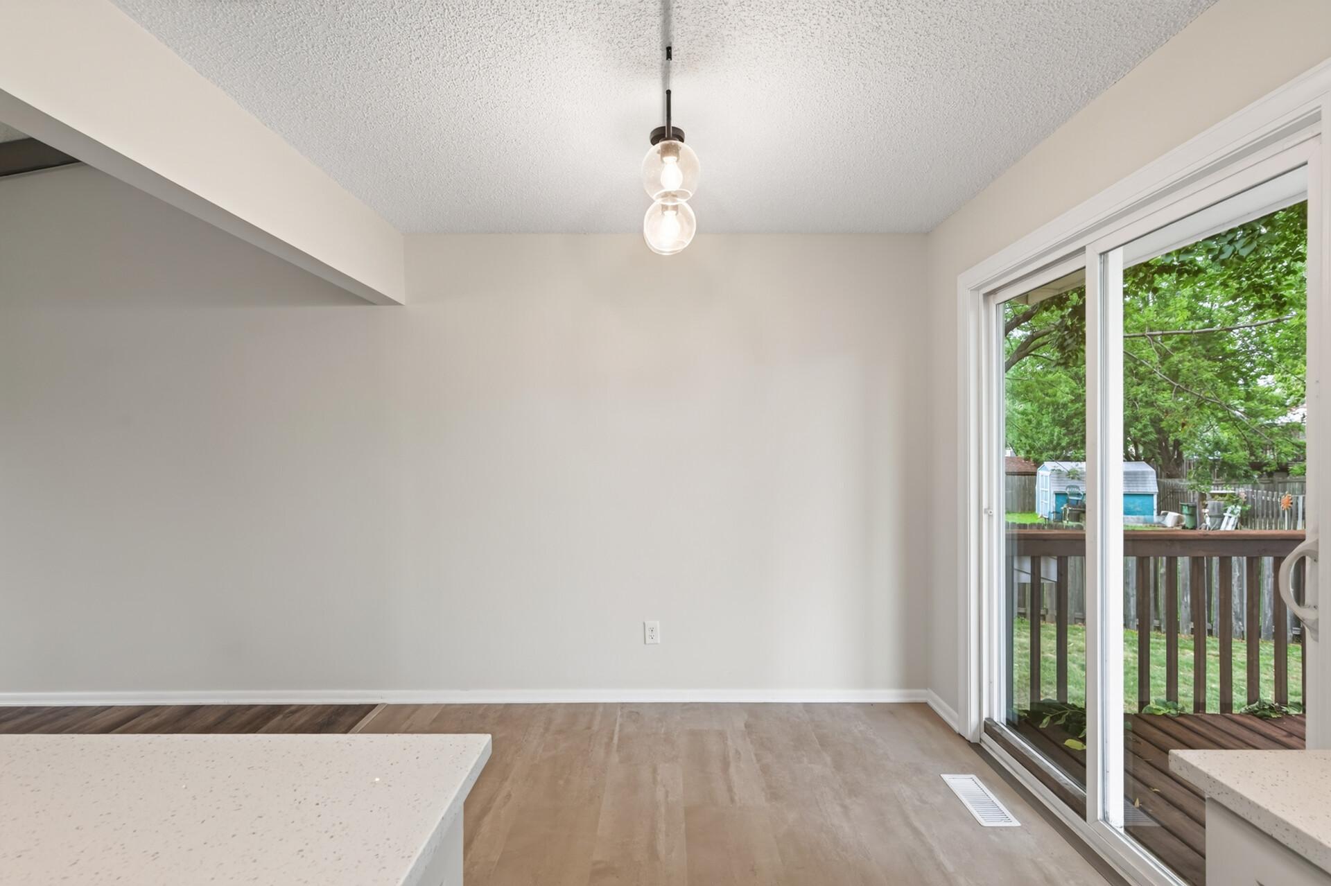 Separate dining area that where a patio door leads to a large deck!