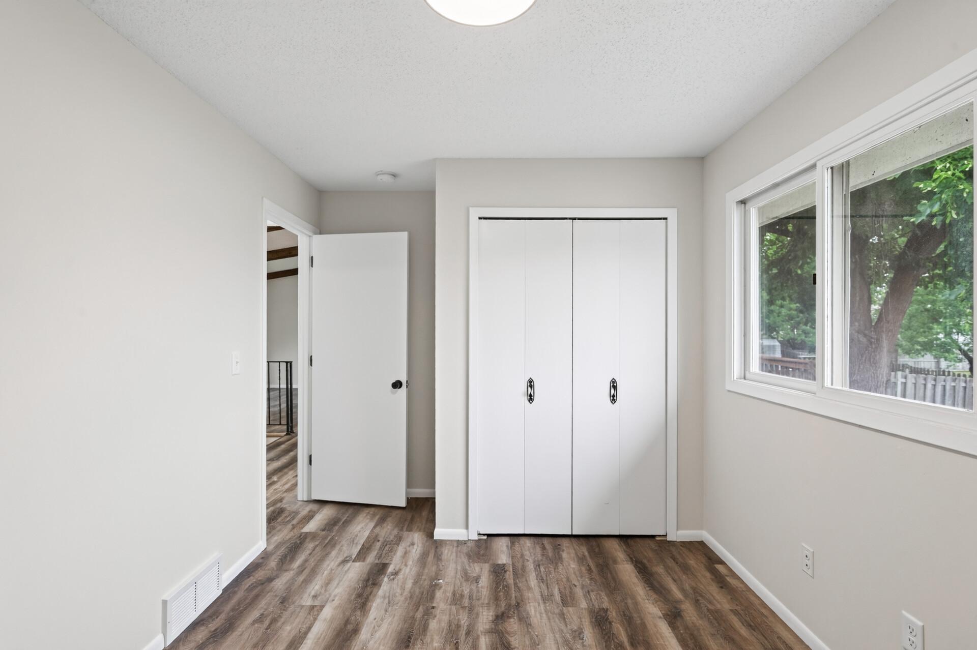 Two bedrooms located on the upper level.