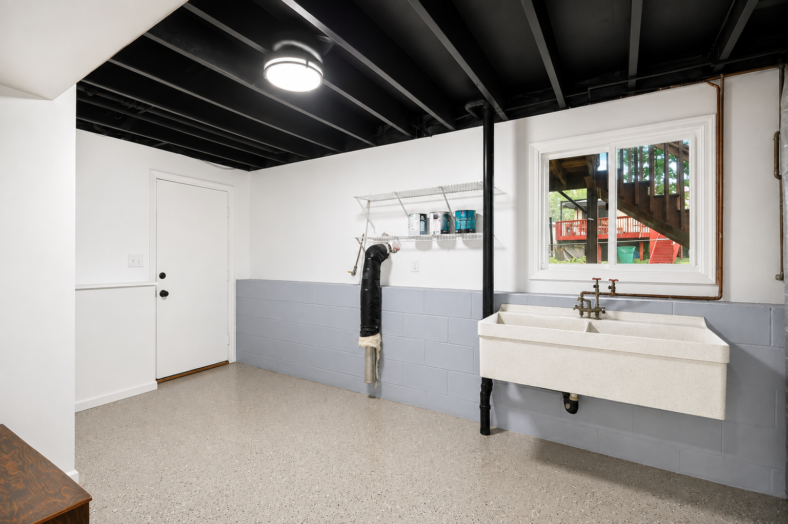 Lower level utility features a separate door to access your garage!