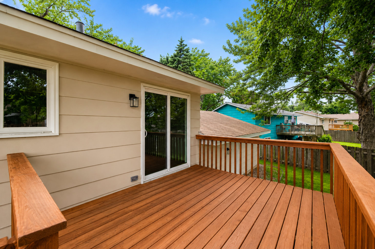 Nice size deck with stairs leading to your yard!