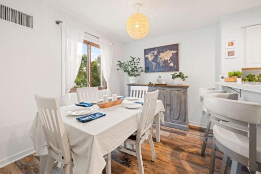 Spacious dining area with room for a full-size table, natural light, and seamless connection to the kitchen.