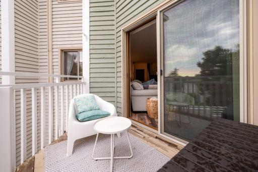 Private balcony accessed directly from the living room provides additional space to relax and enjoy the outdoors.