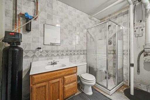 Lower level 3/4 bathroom with new sump pump