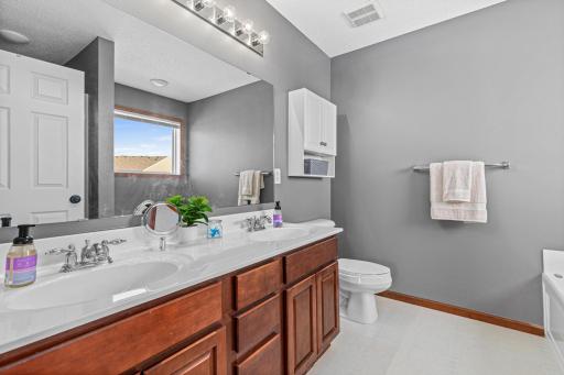 A must have, double vanity sink in your large primary bathroom